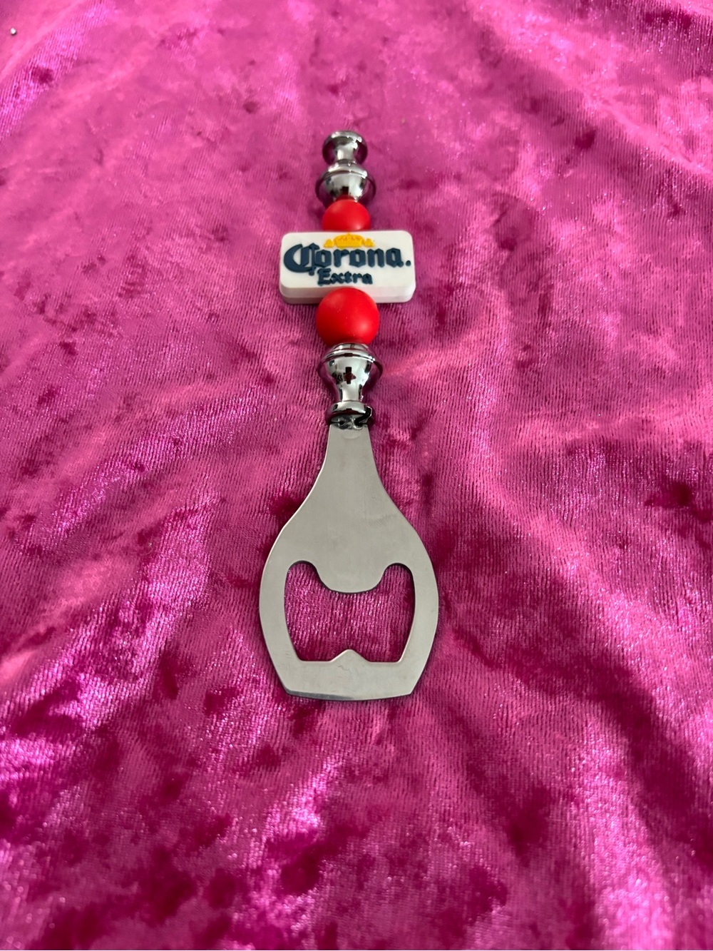 Corona Silver Bottle Opener with Red Beads and White Logo